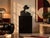 Beautiful vintage art glass sculpture featuring a stylized cowboy silhouette in black and mirrored glass. Signed by the...