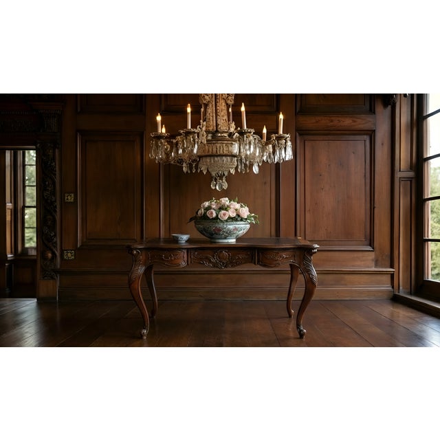 Elegant vintage writing desk crafted in the French Louis XV style, featuring graceful cabriole legs, a serpentine front,...