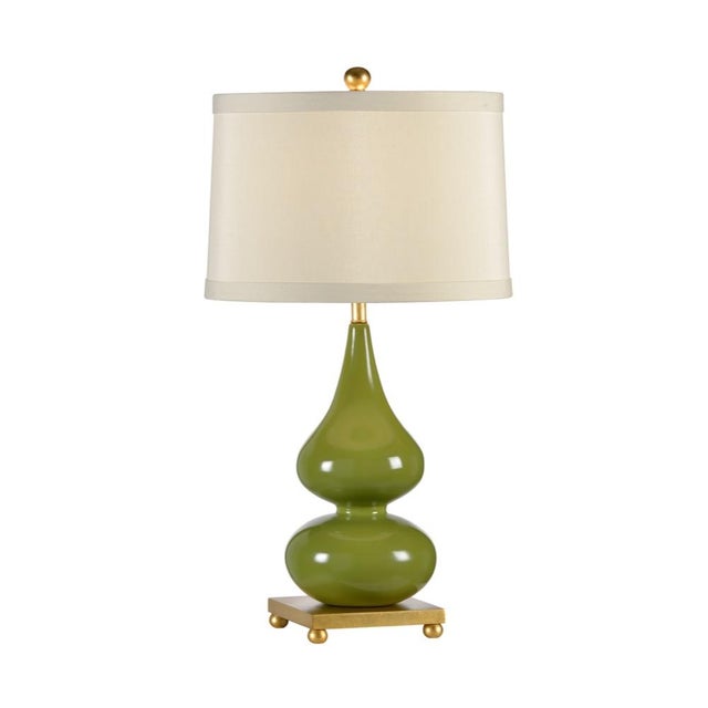 The sleek double gourd shape gives visual intrigue to this 28" table lamp. The gold leaf base emits a soft warm glow and...