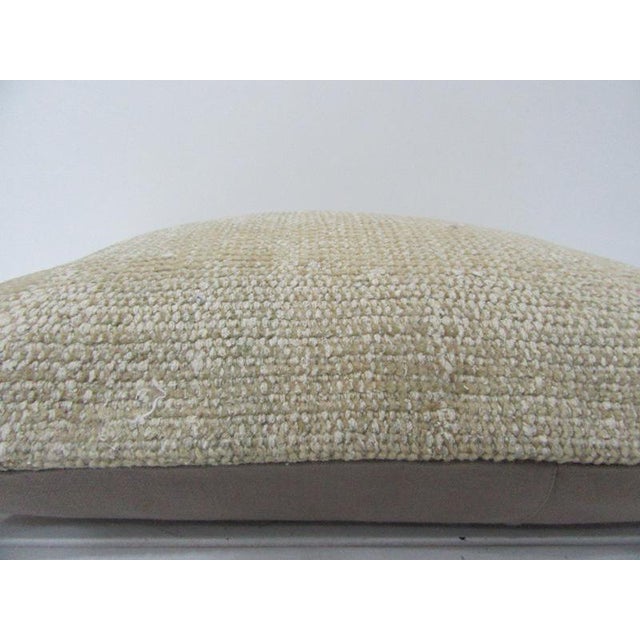 This is a pillow cover made from a vintage kilim rug. The piece was properly washed and ready to use. Pillow inserts not...