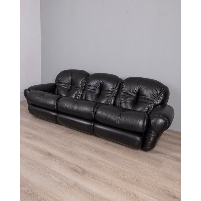 Three-seater sofa with wooden frame and black leather upholstery, Italian design, 1970s.