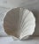 Vintage white glazed ceramic serving platter in the shape of scallop shell. Made in Portugal I believe by Sigma. Marked on...