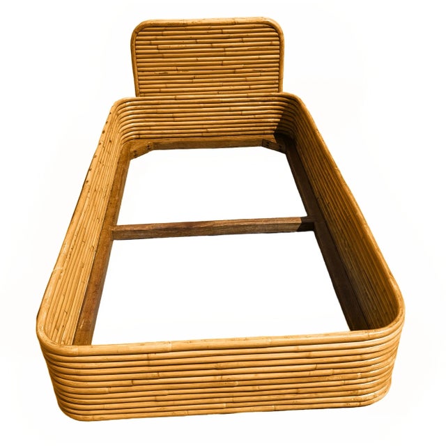 This beautifully restored, stacked Streamline rattan twin-size bed frame with matching headboard is fashioned after the...