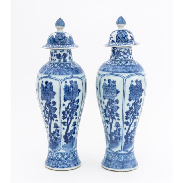 Pair of Chinese Blue and White Porcelain Covered Meiping Vases, Qing Dynasty, with landscape and butterfly vignettes,...