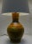 This large signed and handmade ceramic lamp was made in the 1970's. It features a glossy glazed finish and it's an...