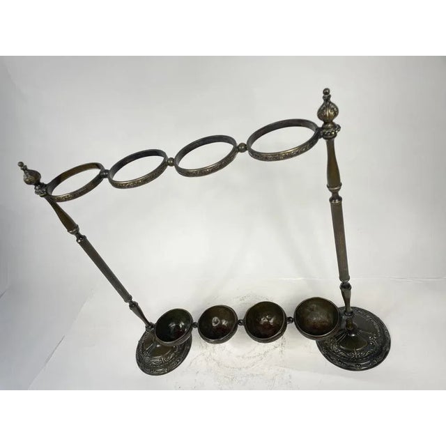 Ancient and beautiful quadruple bronze stand holder, liberty design. Excellent object of furniture. Umbrellas not included.