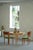 A classic Danish Modern dining table crafted in solid oak, produced by CJ Rosengaarden, Denmark in the 1960s. The table...
