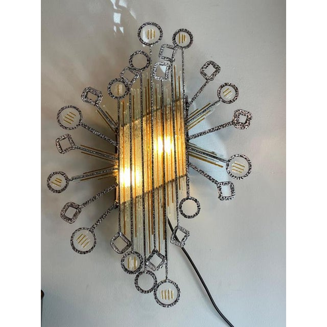 Wrought iron and stained glass sconces by Poliarte, Verona - Italy 1960. The lamp structure is made of wrought iron, the...
