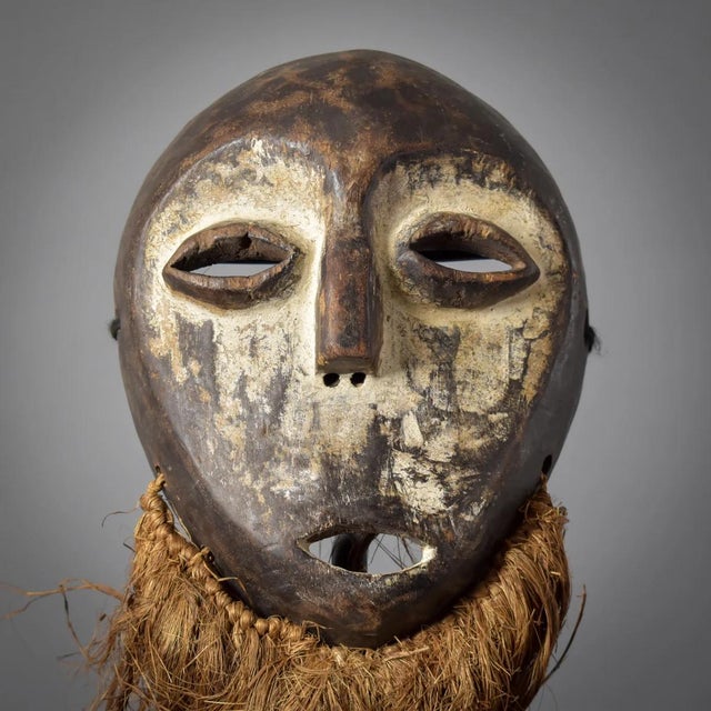 The Lega bearded mask originated from the Lualaba River near Lake Tanganyika in the Democratic Republic of the Congo. This...