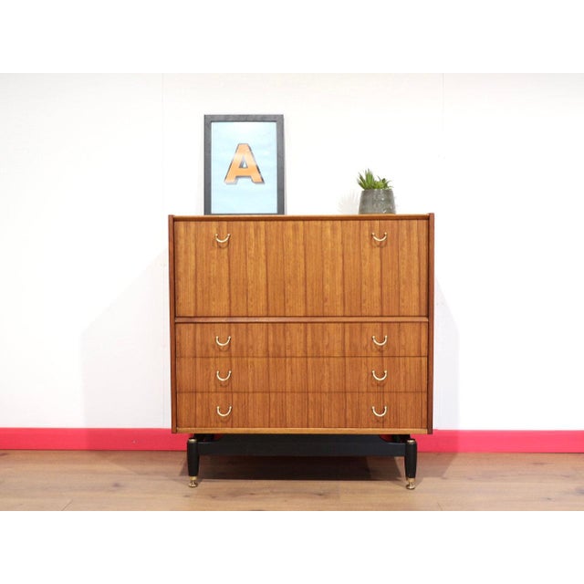 A beautiful piece of furniture made by renowned furniture maker G Plan, this Mid Century Modern Vintage Teak Dresser Bar...