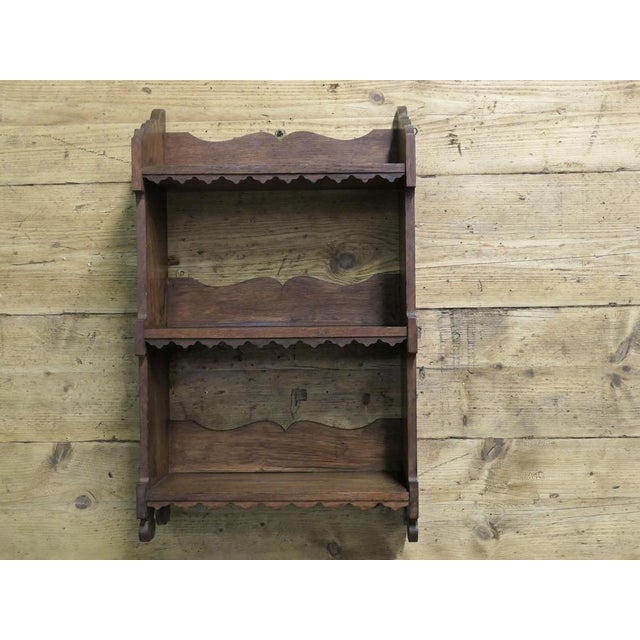 Arts and Crafts Decorative Open Front Wallhanging Shelf This little bookcase has 3 open shelves with a carved and...