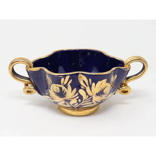 Vintage Italian pottery decorative handled bowl with gilt floral decoration.