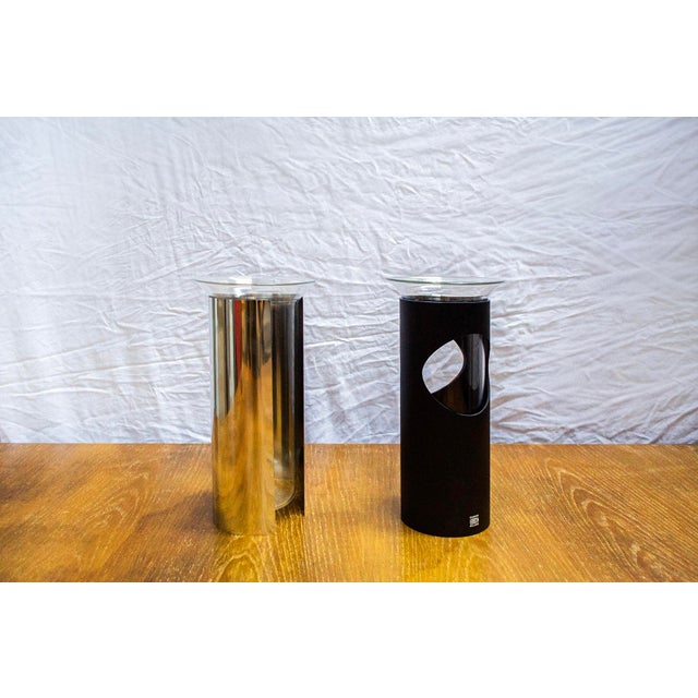 Pair of metal, chromed metal, and glass vases. Camicia Series Designer Enzo Mari Manufacturer Danese 1960s This piece has...