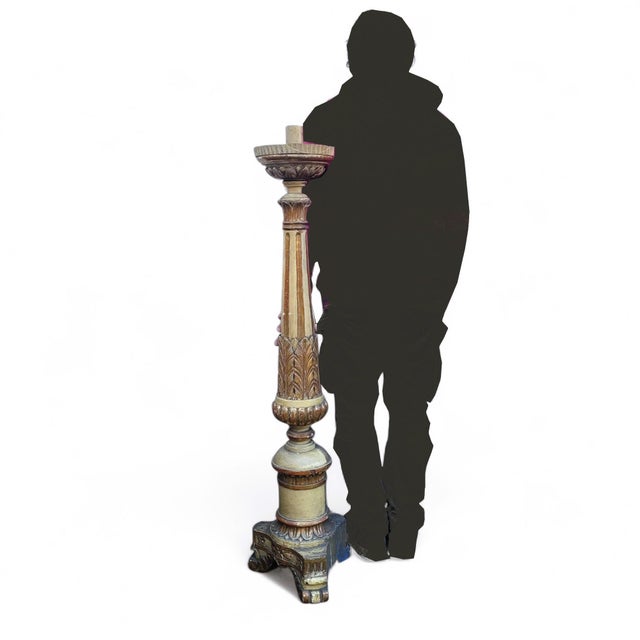 A rare set of six large candlesticks or candelabra, carved from cream-lacquered and gilded wood. Placed on the floor or on...