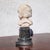 17th Century White Marble Putto Head on a Column For Sale - Image 4 of 18
