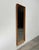Danish wall mirror with an elegant frame made of solid teak.