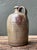 This authentic antique stoneware jug exemplifies the enduring beauty of early utilitarian ceramics, where form and...
