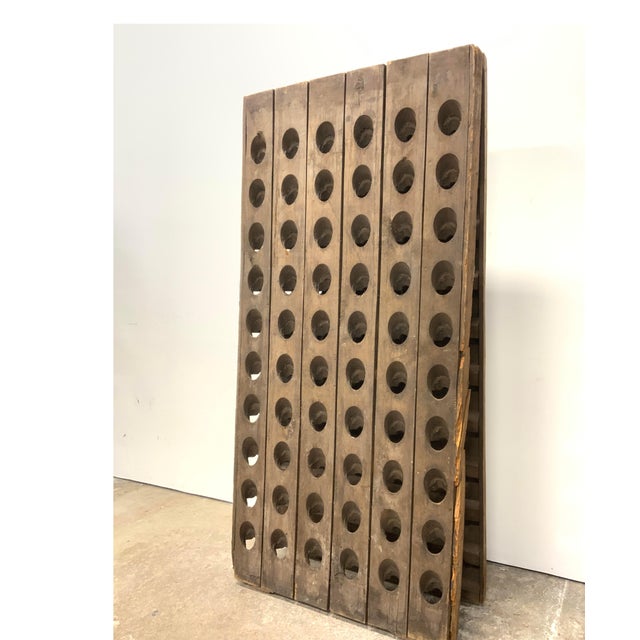 An authentic antique French champagne oak riddling rack dating to the early Victorian period, which can accommodate 120...