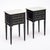A refined pair of French Louis XVI style side tables featuring ebonized wood, gilt-brass accents and beautifully veined...