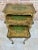 This stylish nest of 3 giltwood side tables feature slender cabriole shaped legs and handmade green paintings. Measures:...