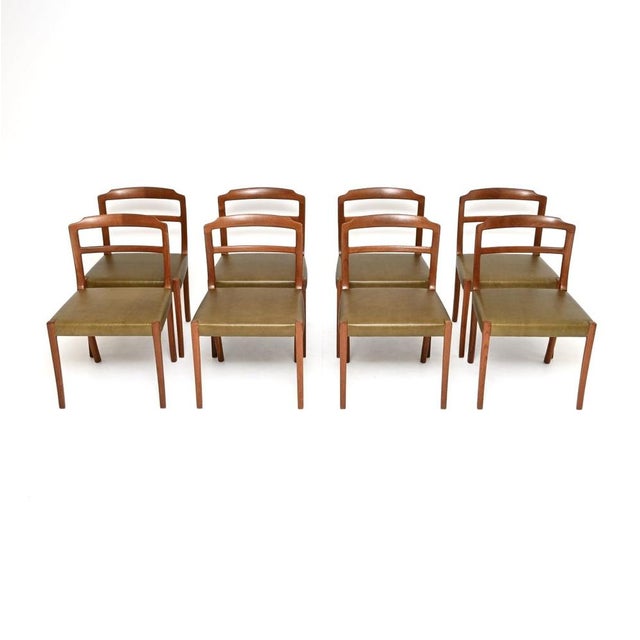A stunning set of eight vintage Danish teak and leather dining chairs by Ole Wanscher. They were recently imported from...