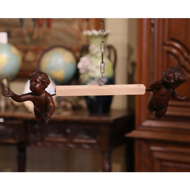 Bring movement and Old World charm to a wall with this delightful pair of antique carved cherubs crafted in Italy circa...