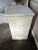 Grange White Wooden Nightstand with Embossed Cabinet Door – Shabby Chic Charm This petite vintage nightstand brings...