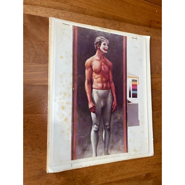 A striking and unconventional 1970s figural print proof depicting a classically posed male figure adorned with theatrical...