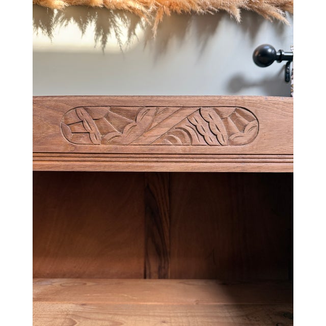 Elegant and full of character, this art deco armoire captivates with its clean lines and authentic look. It embodies the...