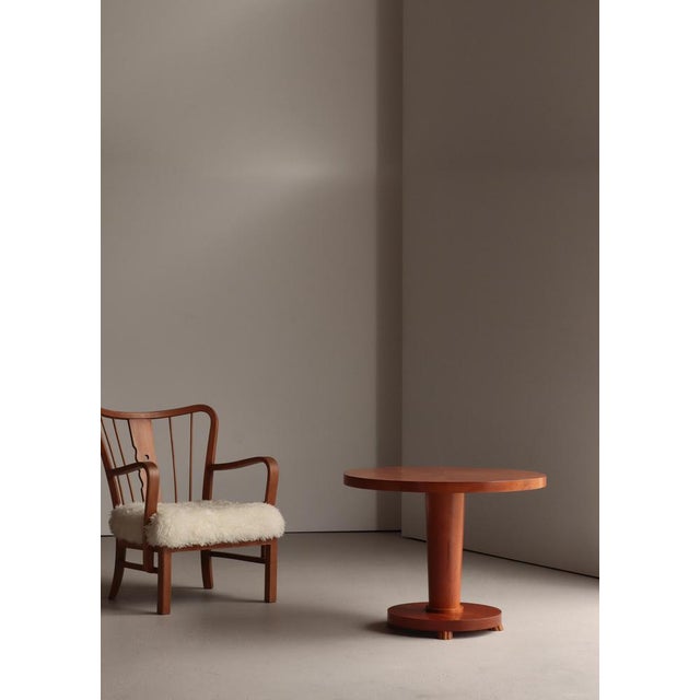 A refined example of Scandinavian Art Deco craftsmanship, this elegant side table embodies the understated sophistication...