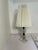 Enhance your space with this stunning pair of original Mid‑Century Modern / Hollywood Regency boudoir table lamps. Each...