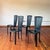 Black leather showstopper dining chairs in excellent condition. Beautiful scalloped details on the backrests. Sossano Italy.