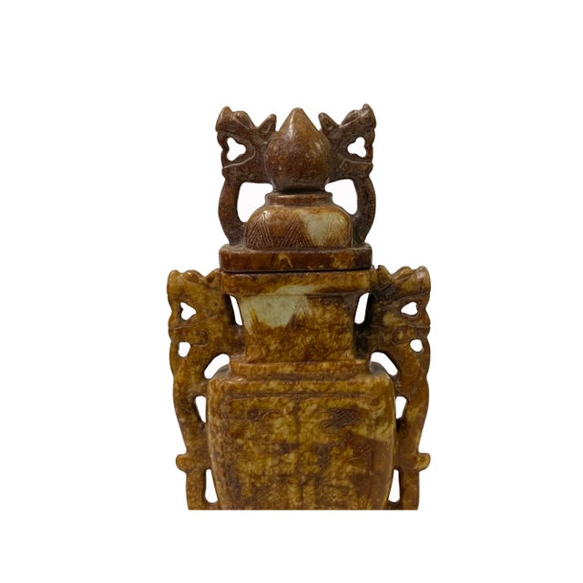 This Chinese Brown Stone Carved Dragon Flat Jar Display Art is a remarkable embodiment of ancient artistic traditions,...