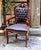 Add timeless sophistication to your interior with this elegant French-style armchair. Crafted from solid wood and...
