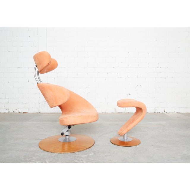 Sculptural design by Norwegian architect and designer Olav Eldøy from 2002. The armchair features a tilting mechanism and...