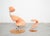Sculptural design by Norwegian architect and designer Olav Eldøy from 2002. The armchair features a tilting mechanism and...