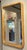 Original retail $1050, stylish Villa and House Modern Burl Wood Emil Wall Mirror, showroom floor sample
