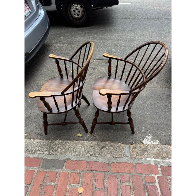 This is a set of 1910s antique captains chairs. They are made by Nichols & Stone. They are a traditional style. They are...