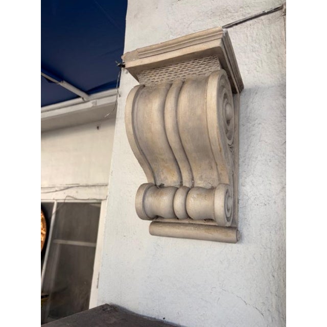 The Pair French Empire Style Composite Classical Decorative Corbel from the 1980s is an antique reproduction piece made of...