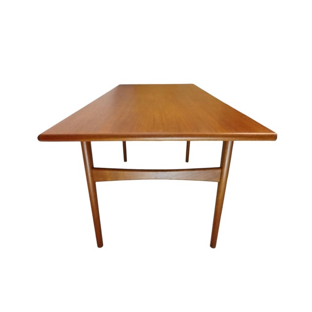 - Simple and elegant frame with subtle organic details characteristic of Scandinavian Modern furniture