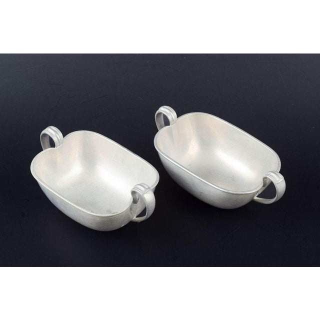 Just andersen (1884–1943) a pair of pewter bowls with double handles. Cast and stamped. designer: just andersen material:...