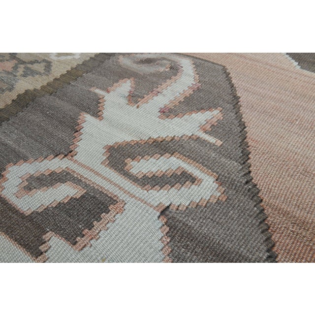 Vintage Hand-Knotted kilim rug is a semi-antique vintage kilim rug. The '70s Eastern region of Anatolia's unique rug is...
