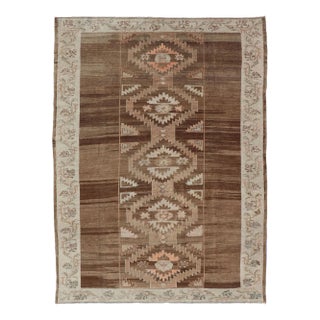 Mid 20th Century Vintage Turkish Kars Rug in Brown Background With Unique Row of Medallions For Sale