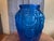 A stunning cobalt blue vase from the 1930s Art Deco period in France. The vase is decorated with flowers and asymmetrical...
