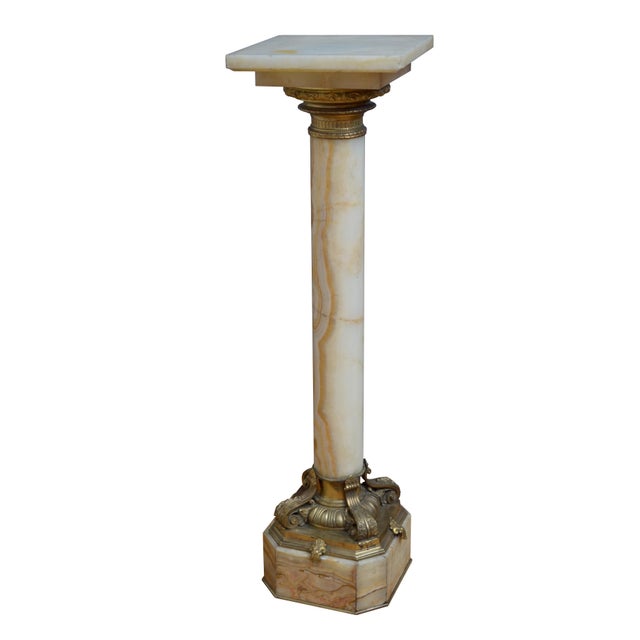 An outstanding French XIXth century multi coloured onyx pedestals, circa 1870, masterfully crafted with exceptional...