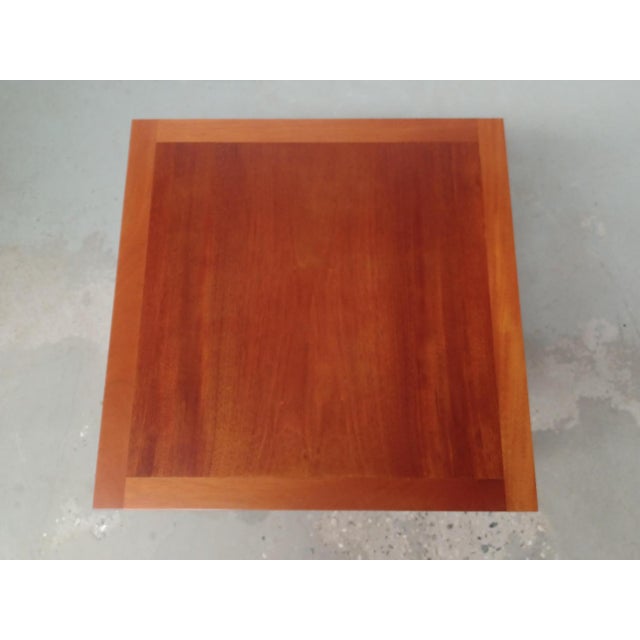 Fully restored Danish mahogany side table by Rud Thygesen and Johnny Sørensen for Botium, 1970s The small well designed...