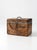 This antique primitive wood storage box features a weathered pine form, iron hardware, and an old hand-painted “VACUUM C”...
