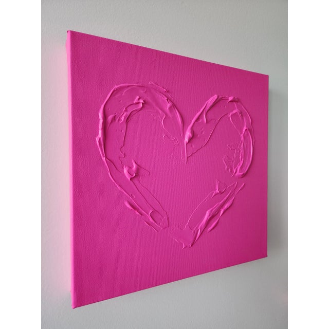 This beautiful bright pink heart works as a perfect pop of color in any space. Measuring 12"X12", it is an amazing little...