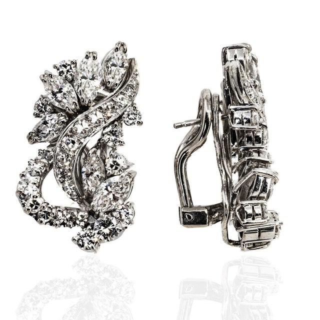 Platinum Earrings with 12 marquis cut diamonds weighing approximately 2.20 carats and 35 round diamonds weighing...