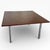 This vintage coffee table features a richly grained rosewood top paired with slim chrome legs, designed to bring a...